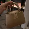 Louis Vuitton Capucines Mini Handbag